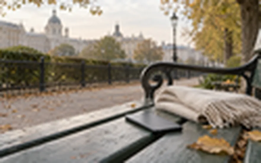 22BET App: Smartphone neben einem Wollschal auf einer herbstlichen Wiener Parkbank